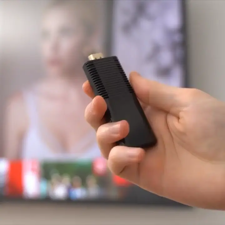 HDMI streaming stick in hand